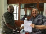 S.Venuji, President, Vakkom Grama Panchayat and Roy Palmer with the letter authorizing the project